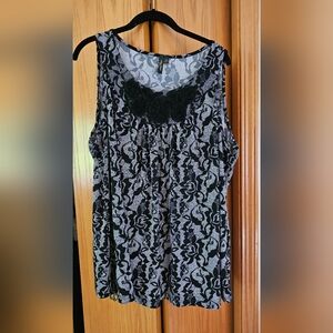 2x tank.  Great by itself or under a cardigan.